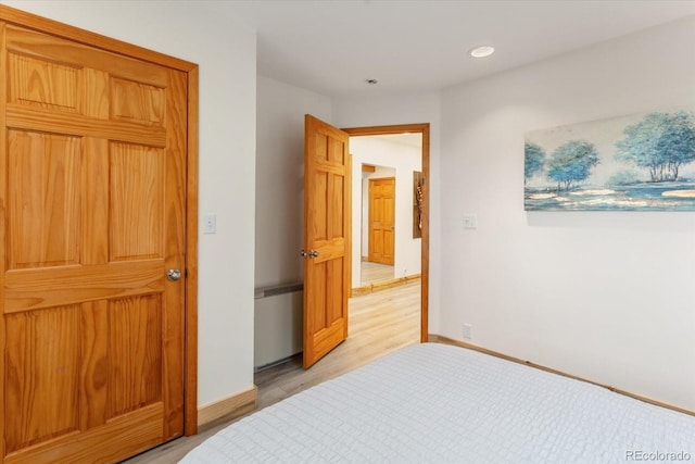 4236 Tranquil Way, Crestone, CO 81131 - bedroom with recessed lighting, baseboards, and light wood-style flooring