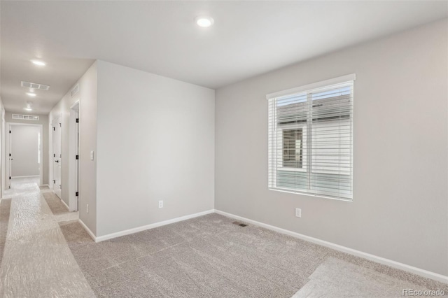 view of carpeted spare room