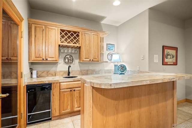 bar featuring light tile patterned floors, indoor wet bar, recessed lighting, black dishwasher, and a sink