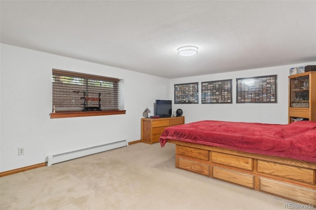 carpeted bedroom featuring a textured ceiling and a baseboard radiator