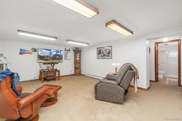 carpeted living room featuring baseboard heating