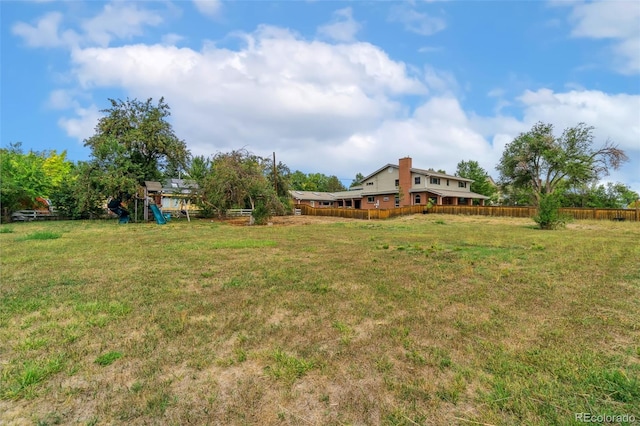 view of yard featuring a playground