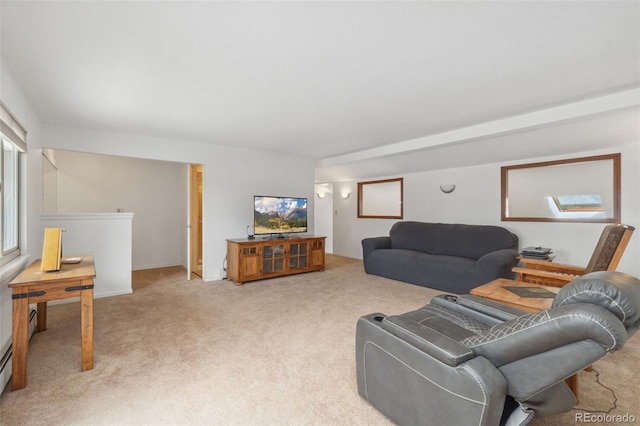 10101 W 72nd Ave, Arvada, CO 80005 - living room with light carpet and a baseboard heating unit