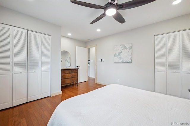 11457 Nancys Dr, Conifer, CO 80433 - bedroom with recessed lighting, wood finished floors, a ceiling fan, and arched walkways