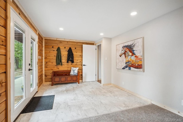 11457 Nancys Dr, Conifer, CO 80433 - mudroom with wood walls and recessed lighting