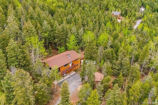 11457 Nancys Dr, Conifer, CO 80433 - view of subject property featuring a heavily wooded area