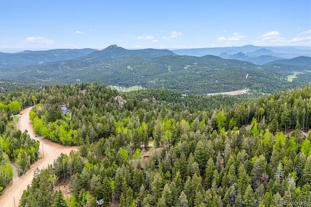 11457 Nancys Dr, Conifer, CO 80433 - view of mountain backdrop featuring a heavily wooded area