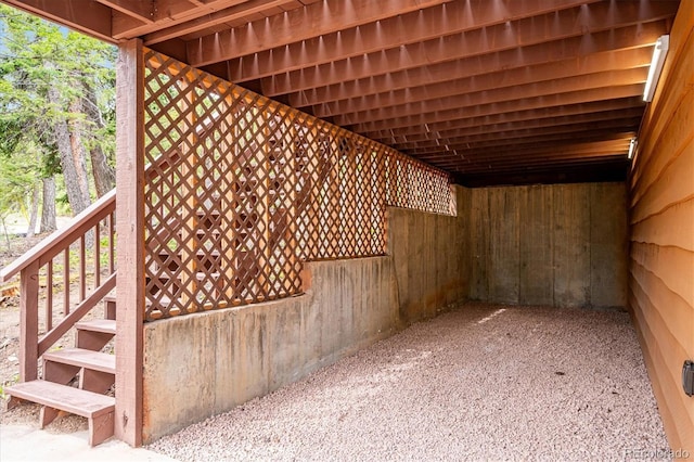 11457 Nancys Dr, Conifer, CO 80433 - wooden deck featuring an attached carport