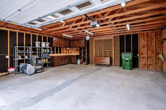 11457 Nancys Dr, Conifer, CO 80433 - garage featuring a garage door opener