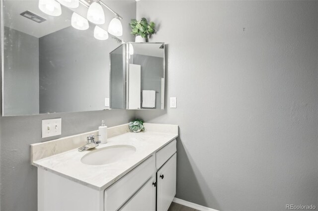 12097 E Mexico Ave, Aurora, CO 80012 - bathroom featuring vanity