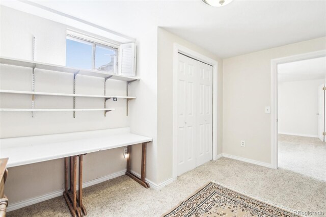 12097 E Mexico Ave, Aurora, CO 80012 - unfurnished office with light colored carpet and baseboards