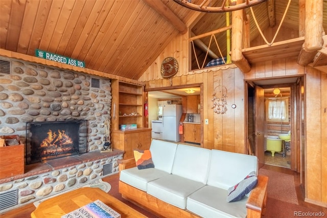 living room featuring wood walls, high vaulted ceiling, and wooden ceiling