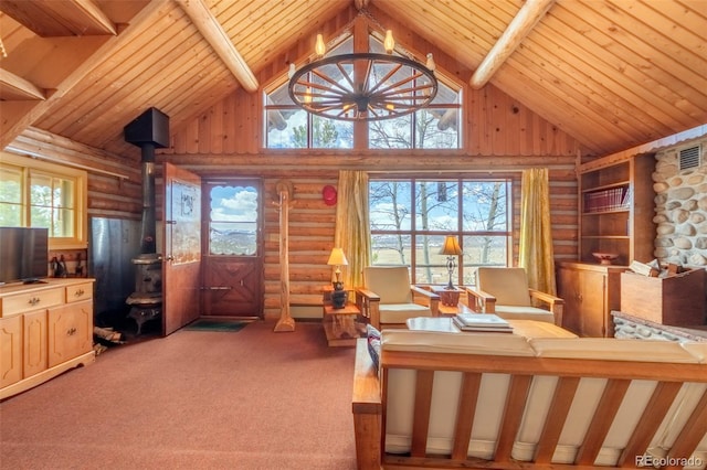 bedroom featuring wooden ceiling and log walls