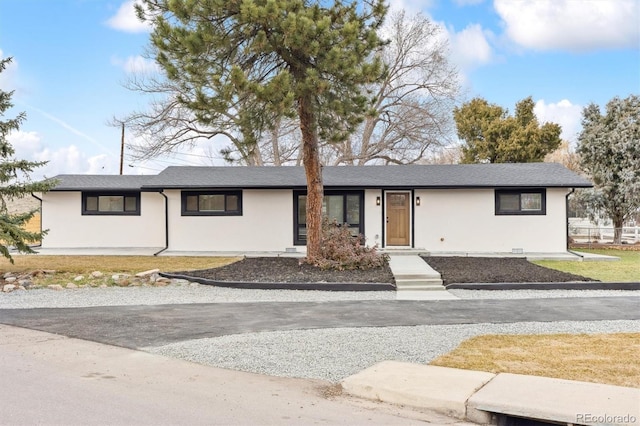 view of front of house with stucco siding