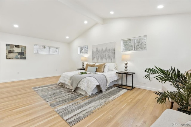 bedroom featuring recessed lighting, vaulted ceiling with beams, light wood-style floors, and baseboards