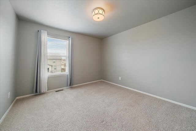 1181 W 170th Ave, Broomfield, CO 80023 - carpeted empty room with baseboards