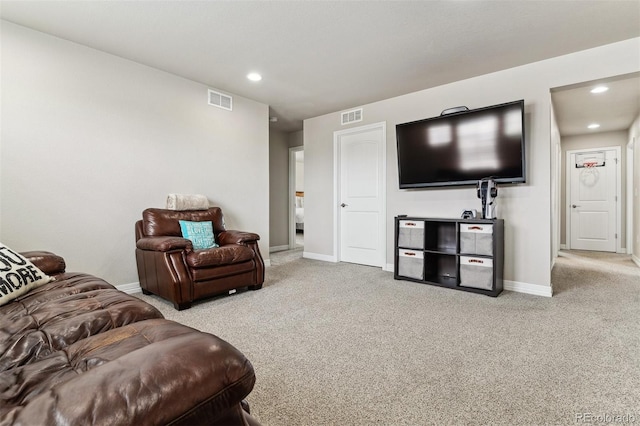 living area with recessed lighting, carpet floors, baseboards, and visible vents