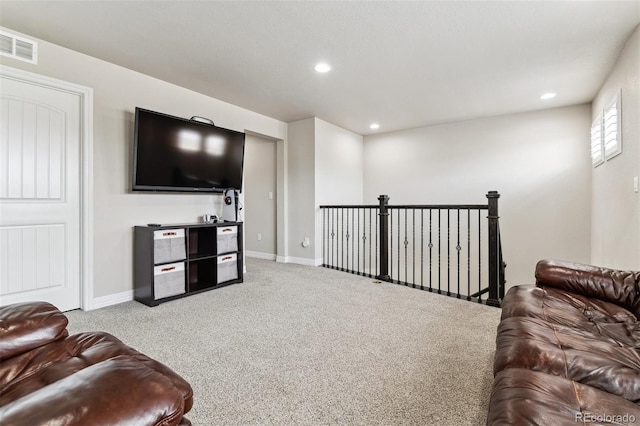 living area with baseboards, carpet floors, visible vents, and recessed lighting