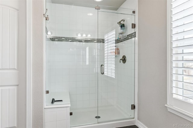 bathroom with a stall shower