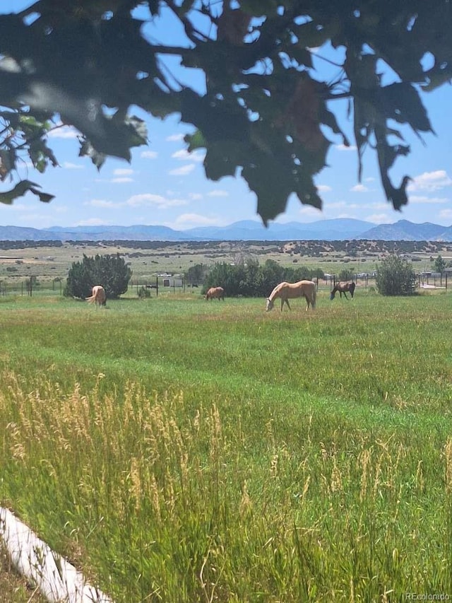 view of mountain feature with a rural view