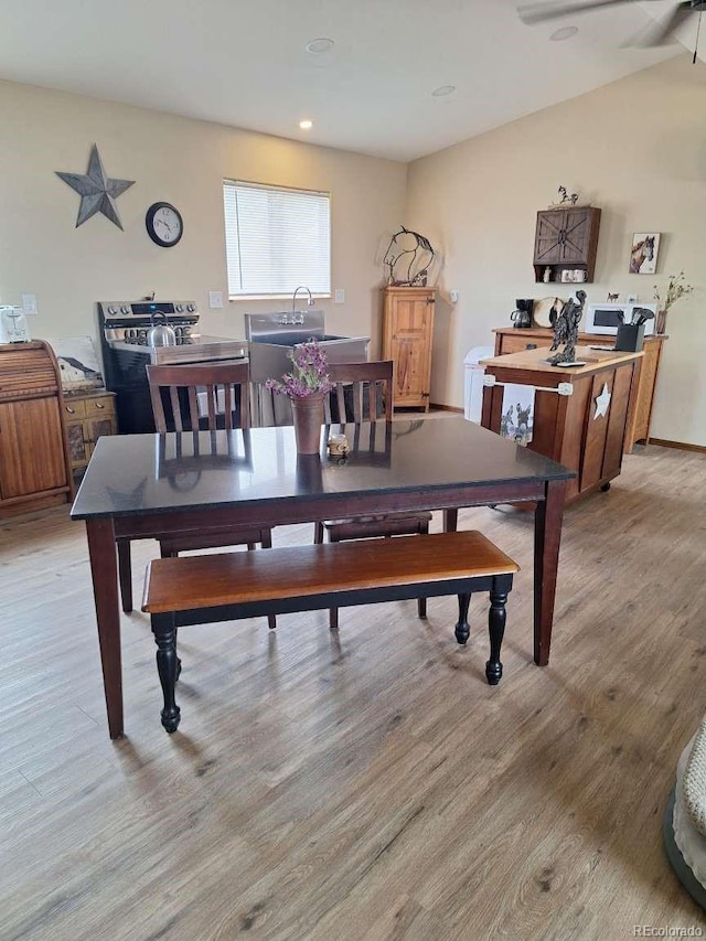 dining space with light wood-type flooring