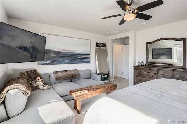 bedroom with light carpet and ceiling fan