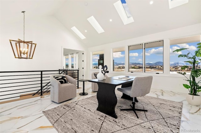 office with a skylight, a chandelier, high vaulted ceiling, and a mountain view