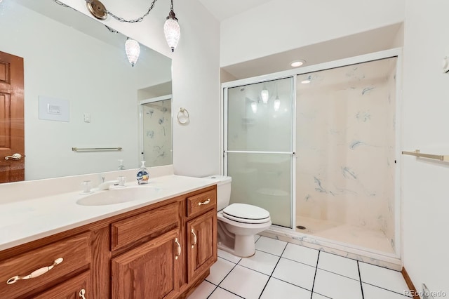16710 Vincent Ave, Monument, CO 80132 - bathroom with tile patterned floors, vanity, and a shower stall