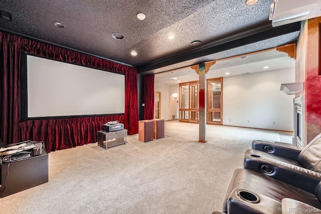 16710 Vincent Ave, Monument, CO 80132 - home theater with carpet, a fireplace, a textured ceiling, and recessed lighting