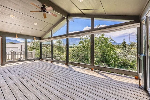 16710 Vincent Ave, Monument, CO 80132 - unfurnished sunroom featuring a ceiling fan and a mountain view
