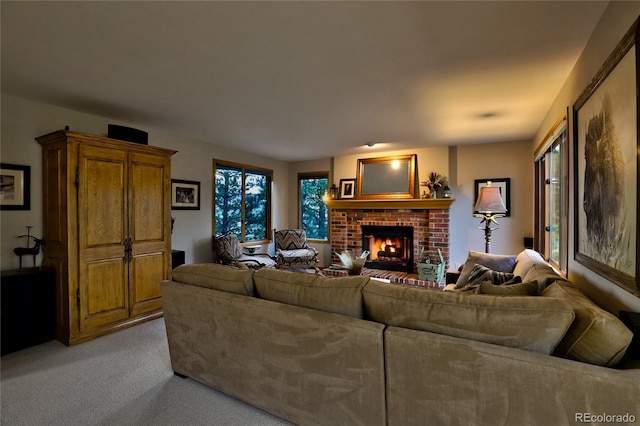 living room featuring light carpet and a fireplace