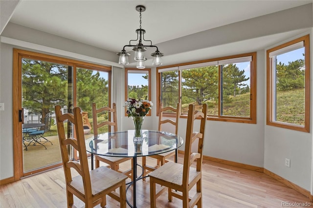 dining area with light wood-type flooring