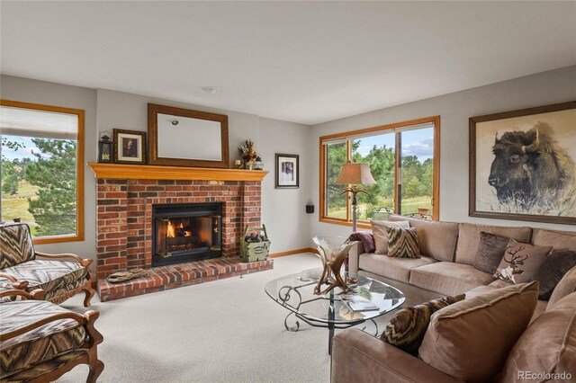 386 Monte Vista Rd, Golden, CO 80401 - living area featuring carpet floors, healthy amount of natural light, a brick fireplace, and baseboards