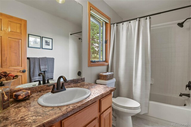 386 Monte Vista Rd, Golden, CO 80401 - bathroom with toilet, vanity, shower / bathtub combination with curtain, and tile patterned flooring