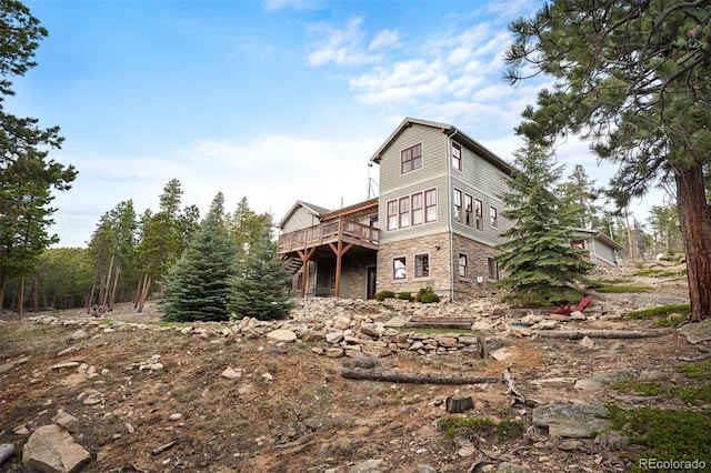 1055 Divide View Dr, Golden, CO 80403 - exterior space with a deck and stone siding