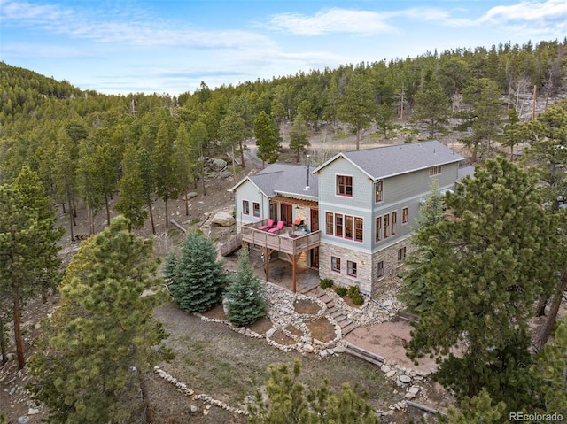 1055 Divide View Dr, Golden, CO 80403 - drone / aerial view featuring a view of trees