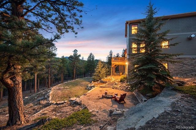 1055 Divide View Dr, Golden, CO 80403 - view of yard with an outdoor fire pit and a balcony