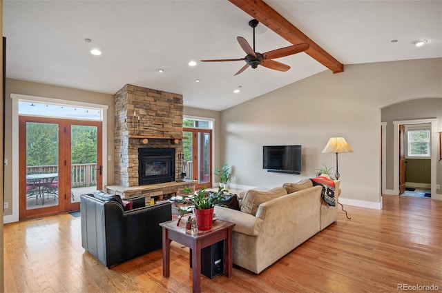 1055 Divide View Dr, Golden, CO 80403 - living room with a ceiling fan, a fireplace, vaulted ceiling with beams, recessed lighting, and light wood-style flooring