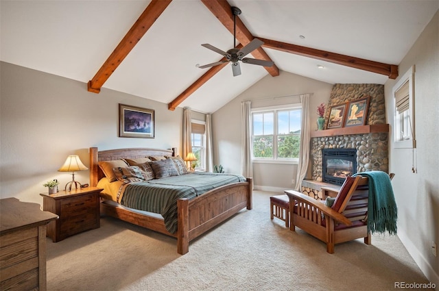 1055 Divide View Dr, Golden, CO 80403 - bedroom with ceiling fan, carpet floors, a stone fireplace, baseboards, and vaulted ceiling with beams