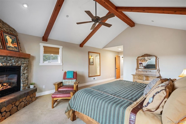 1055 Divide View Dr, Golden, CO 80403 - bedroom featuring beam ceiling, carpet floors, high vaulted ceiling, a stone fireplace, and baseboards