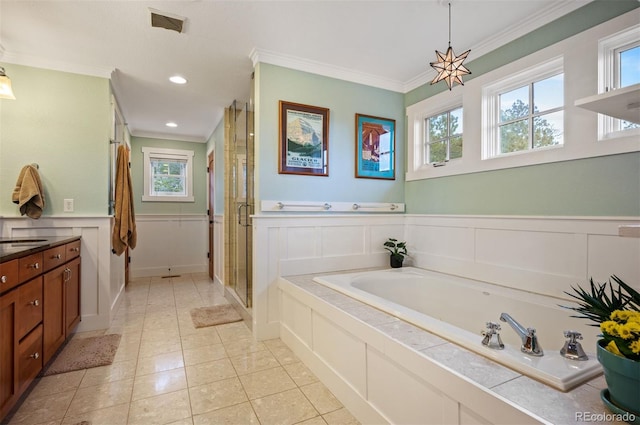1055 Divide View Dr, Golden, CO 80403 - bathroom featuring a healthy amount of sunlight, a wainscoted wall, ornamental molding, and a decorative wall