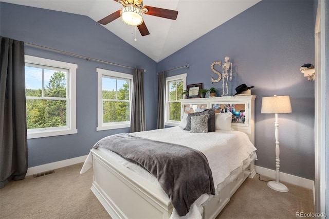 1055 Divide View Dr, Golden, CO 80403 - carpeted bedroom with visible vents, a ceiling fan, baseboards, and lofted ceiling