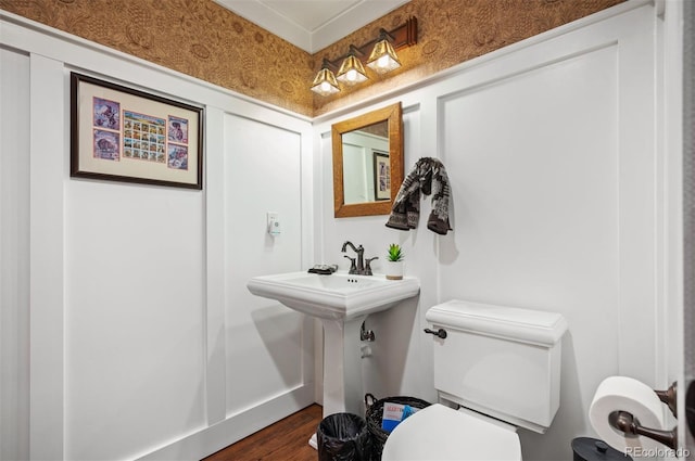 1055 Divide View Dr, Golden, CO 80403 - half bathroom featuring toilet and wood finished floors