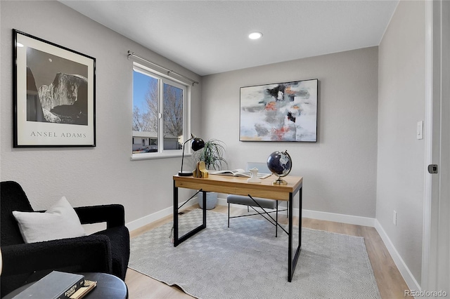 office space with recessed lighting, baseboards, and wood finished floors