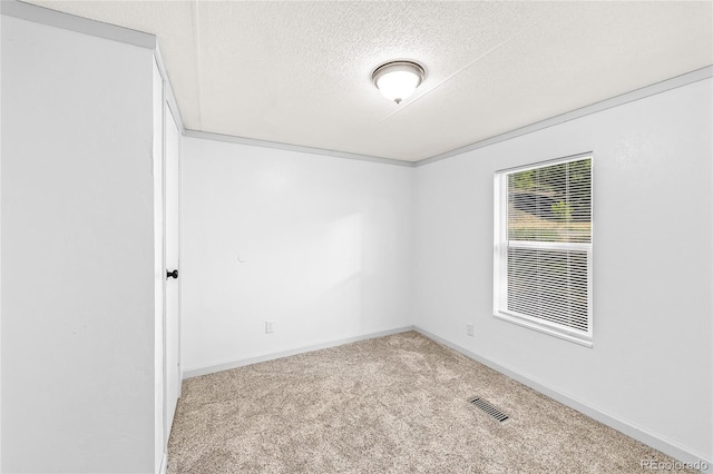 120 Pinon Dr, Hotchkiss, CO 81419 - carpeted spare room featuring a textured ceiling and baseboards