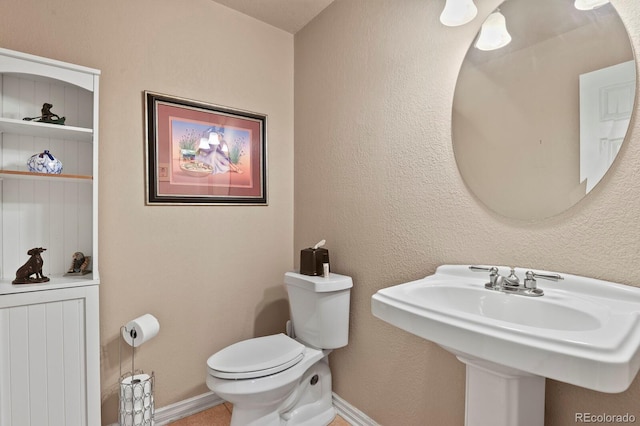 bathroom featuring toilet