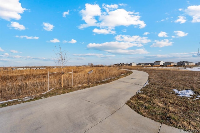 view of road with a residential view