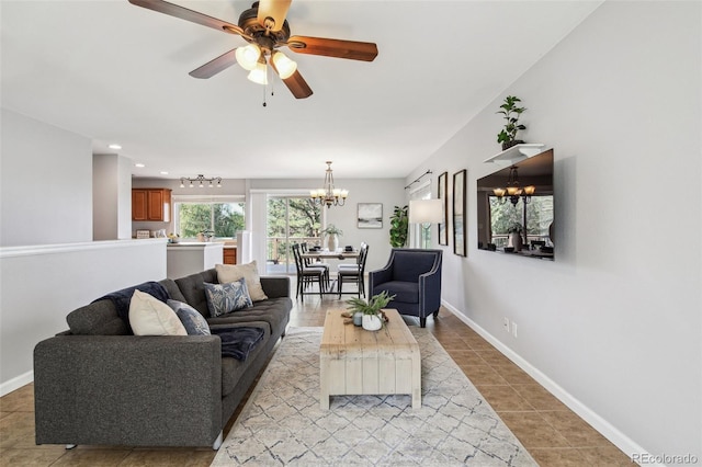 4231 W Ponds Cir, Littleton, CO 80123 - living area with a chandelier, light tile patterned flooring, ceiling fan, and recessed lighting