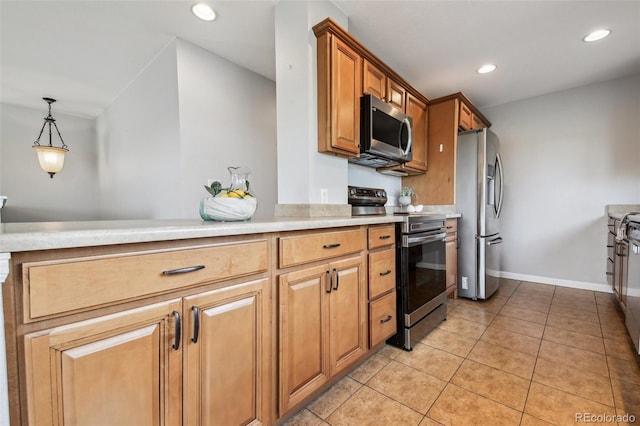 4231 W Ponds Cir, Littleton, CO 80123 - kitchen featuring appliances with stainless steel finishes, light tile patterned floors, light countertops, recessed lighting, and brown cabinetry