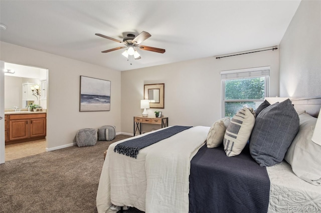 4231 W Ponds Cir, Littleton, CO 80123 - bedroom featuring light carpet, connected bathroom, and ceiling fan